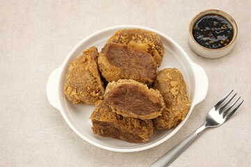 Tahu Walik, fried tofu stuffed with meatball. Indonesian food
