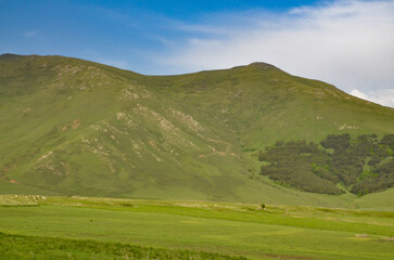 Ughtanist Mount and Tsaghkunyats mountain range in spring scenic view from Aparan-Spitak highway (Aragatsotn Province, Armenia) 
