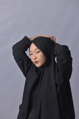 Asian Hijab Woman with Face Expressions and Gestures