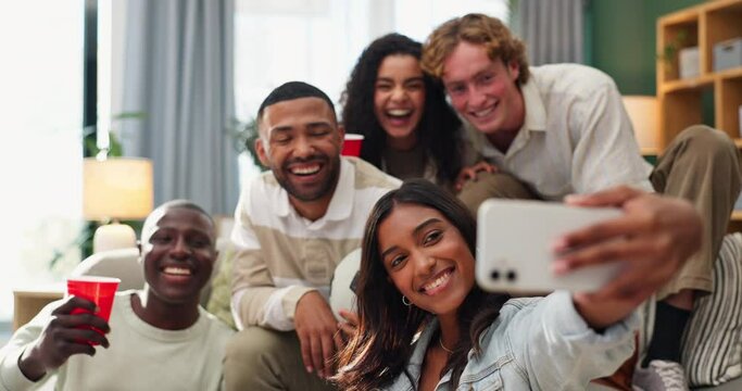 Friends, excited and selfie on sofa for football game, socializing and reunion in living room. Diverse group, students or happy for soccer streaming, social media update and smiling for photography
