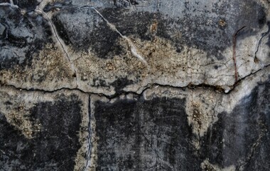 cracked concrete wall covered with gray cement surface as background, rack concrete white wall or Cement wall background, Broken hole in white wall. Abstract background.