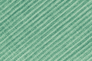 Ridge texture background of velour green cloth. Large ribbed, diagonal coarse weaving fabric