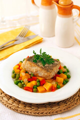 Cod with vegetables.