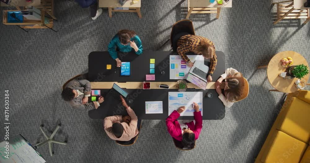 Poster top down view of young, diverse entrepreneurs in a colorful office, solving problems and designing s
