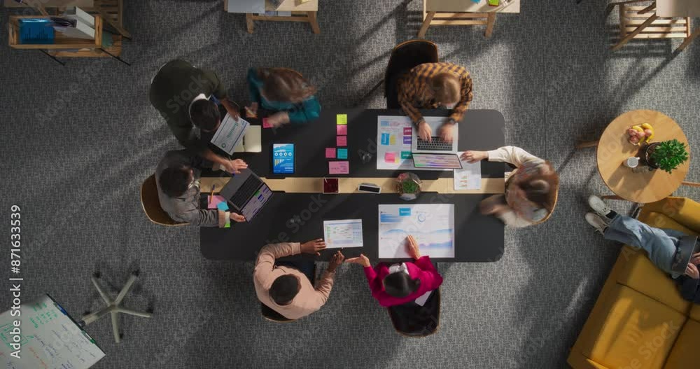 Fototapete Top Down View In Timelapse: Diverse Team of Professionals in a Creative Office Space Brainstorming and Analyzing Data. Businesspeople Collaborate on Digital Projects Using Laptops and Tablets.