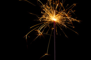Christmas Bengali fire on black background
