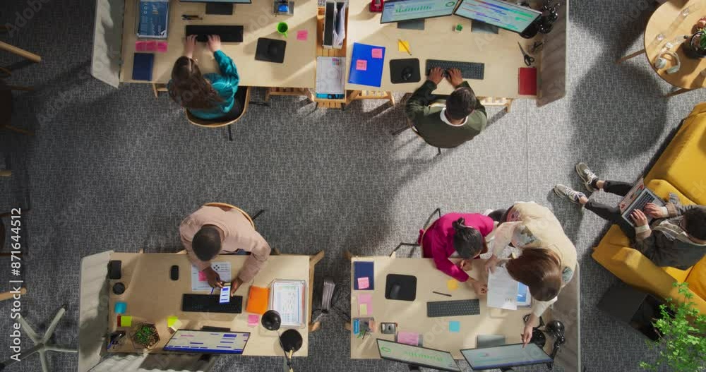 Poster Top Down View: Diverse Team of Professionals Working on Digital Marketing Projects. Businesspeople Analyze Data, Discuss Strategies, and Use Desktop Computers in An Office. Creative Workspace Concept.