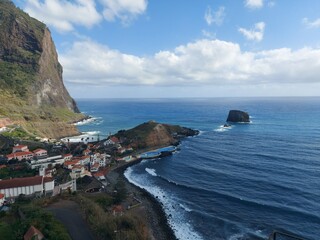 water, sea, ocean, island, coast, shore, coastline, sky, blue, beach, paradise, rock, relax, travel, tourism, mountain, cliff, green, blue, waves