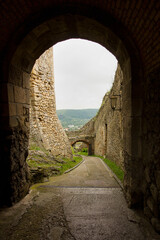Obraz premium ancient Trencin Castle in Slovakia 11th century. A wall with an archway.