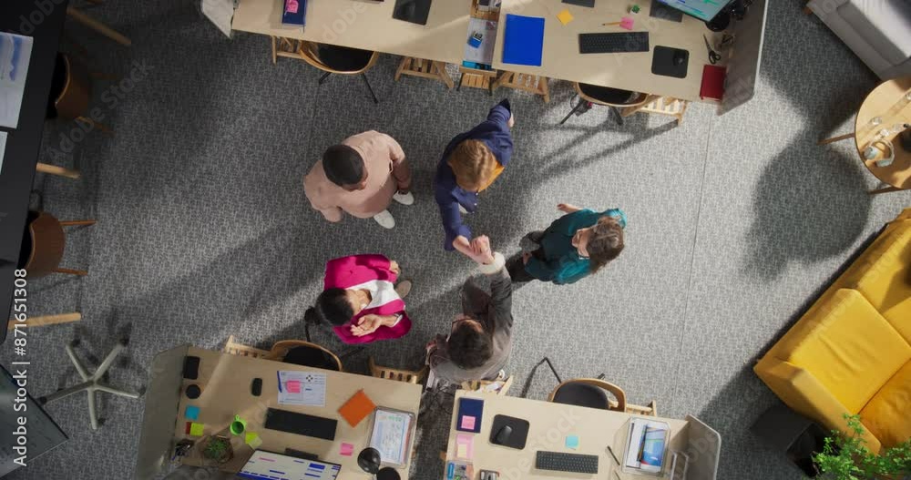 Fototapete top down view of diverse team stacking hands in an office, symbolizing unity and teamwork. professio