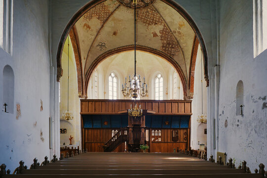 Interior of the medieval (12-15th century) protestant church of Holwierde (Stephanus Church or Stefanuskerk), with 15th-century oak rood screen. Province of Groningen, the Netherlands
