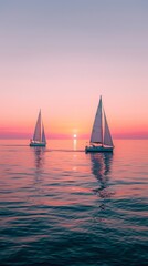 Calm sea and pink gradient sky with sailboats on the horizon. Beautiful seascape with sailboats during sunrise or sunset.