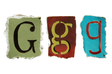 G alphabet torn from a magazine paper. Ransom note style letters.