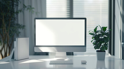 A mockup of a computer monitor in a stylish office. There is a computer monitor on the desk next to the potted plant. The table is clean and tidy