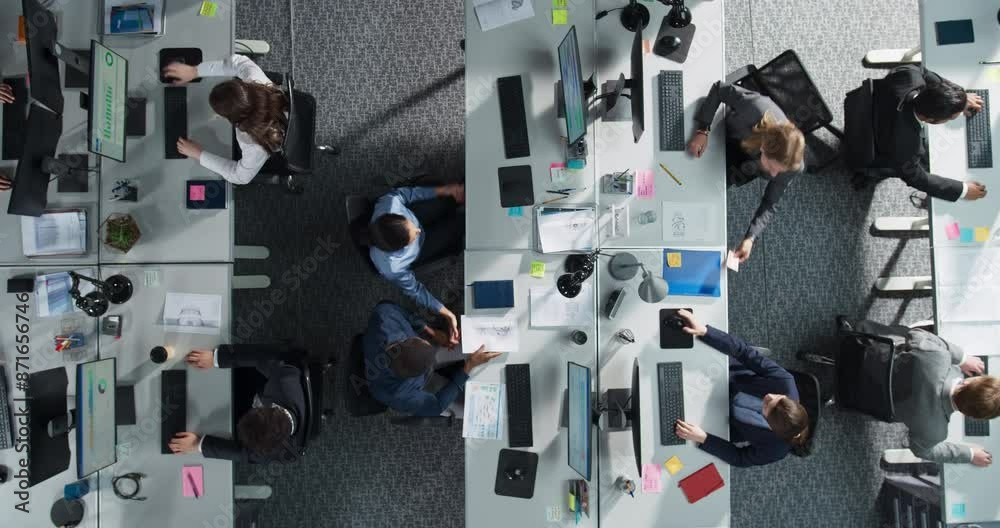 Fototapete top down view: diverse team of professionals in an office, working on desktop computers with documen