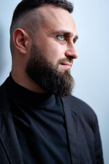 Obraz premium Studio portrait of young handsome man with beard.