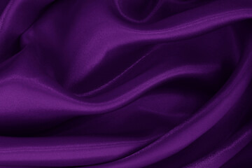 Obraz premium Purple fabric cloth texture for background and design art work, beautiful crumpled pattern of silk or linen.