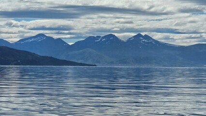 Beautiful sky over the fjords in Norway. Summer. June. Time for white nights. HDR light.