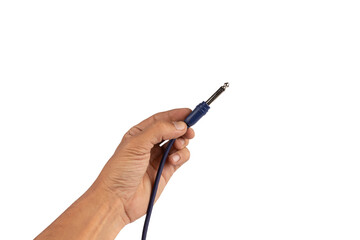 Black male hand holding an audio Jack cable isolated on white background