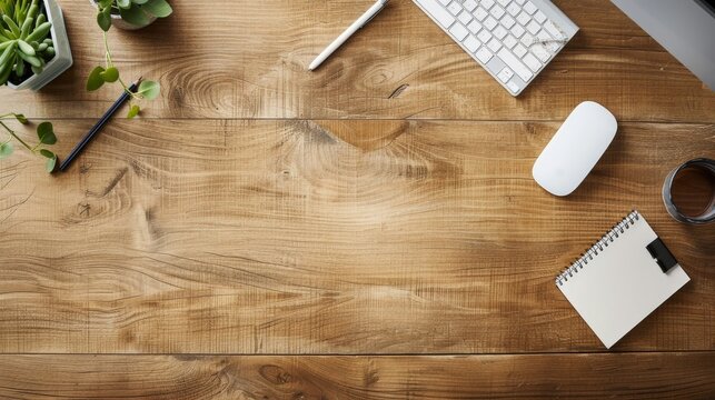 Top View of an Organized Workspace with a Wooden Desk