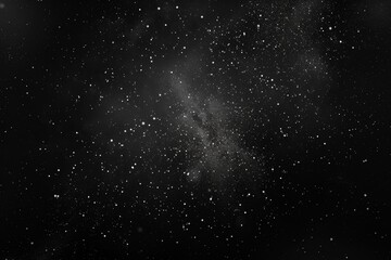 Naklejka premium Stain texture abstract background. A black surface with white dust and scratches. A white space between them.