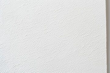 A seamless texture of white cement wall with a rough surface, for a background.
