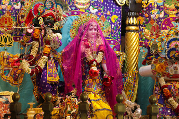 Radha and Krishna on the altar in a Hindu temple in India.