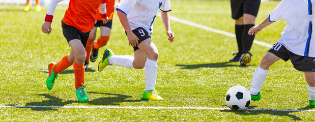 Kids Kicking Soccer School Tournament Match. Children Playing Sports Game. Running European...