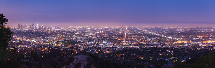 Panoramic view of Los Angeles cityscape at night, traffic lights