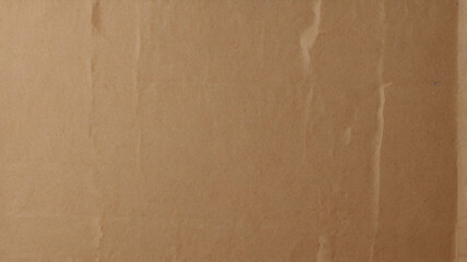 Creased pale light brown environmental friendly packaging butcher blank paper with texture background minimalism style and space for branding design.