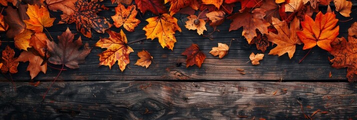 Autumnal leaves on rustic wooden background, perfect seasonal foliage for cozy vibes