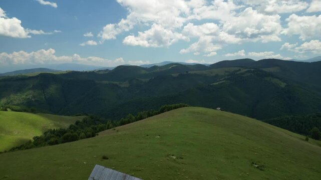 Aerial view above the mountain's meadow, in the Carpathian Mountains, Romania.