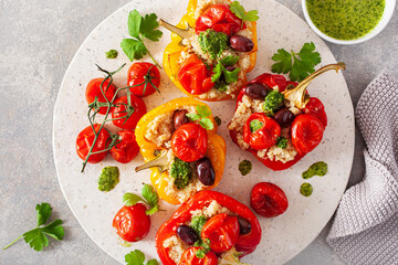 stuffed bell peppers with quinoa tomatoes olives and herb sauce chimichurri