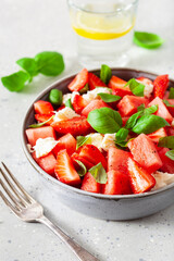 watermelon salad with strawberry mozzarella cheese basil. healthy summer dessert