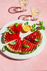 grilled watermelon slices with lemon and basil. summer dessert