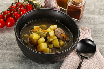 Soup with meatball and potato