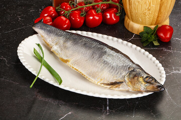 Whole raw salted herring fish