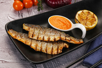 Grilled seabass fillet with lemon
