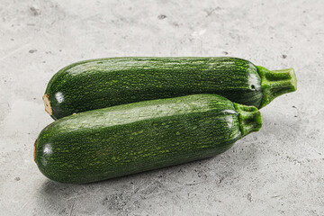 Raw green ripe zucchini vegetable