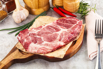 Raw pork neck steak for grill