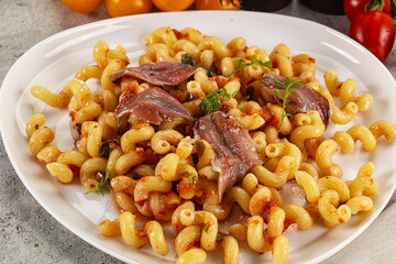 Italian pasta cellentani with anchovy