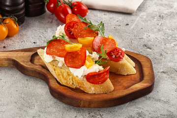 Bruschetta tapas with chorizo and tomato