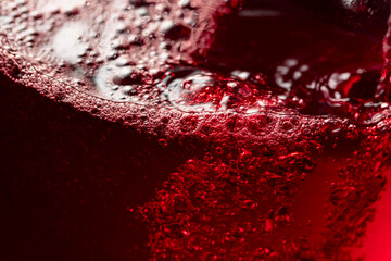 Red wine abstract splashing in glass.