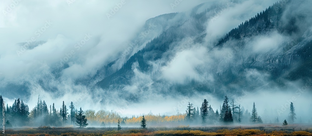 Aufkleber mountain landscape with copy space image featuring drifting low clouds.