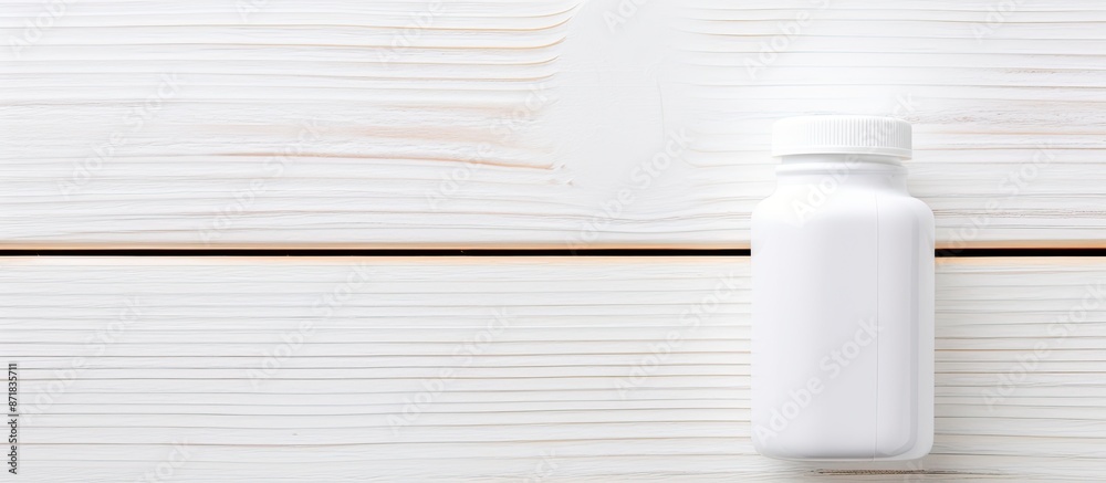 Aufkleber white wooden background displaying a pill bottle with copy space image.