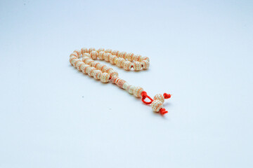 Rosary or prayer beads, isolated on white background	