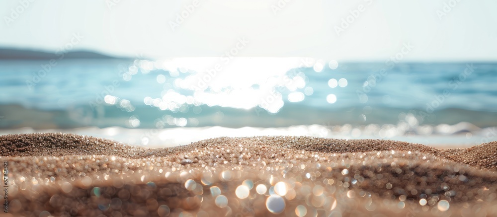 Poster close-up of a sandy beach with the sea in the background, offering copy space image.