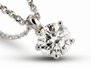 Close-up of a stunning diamond pendant necklace with a sparkling solitaire stone and silver chain, showcasing elegance and timeless beauty.