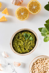 Fresh homemade pesto sauce in a bowl. Italian cuisine. Recipe.