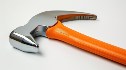 Fototapeta premium Close up of a new hammer with an orange plastic handle On white background with room for text